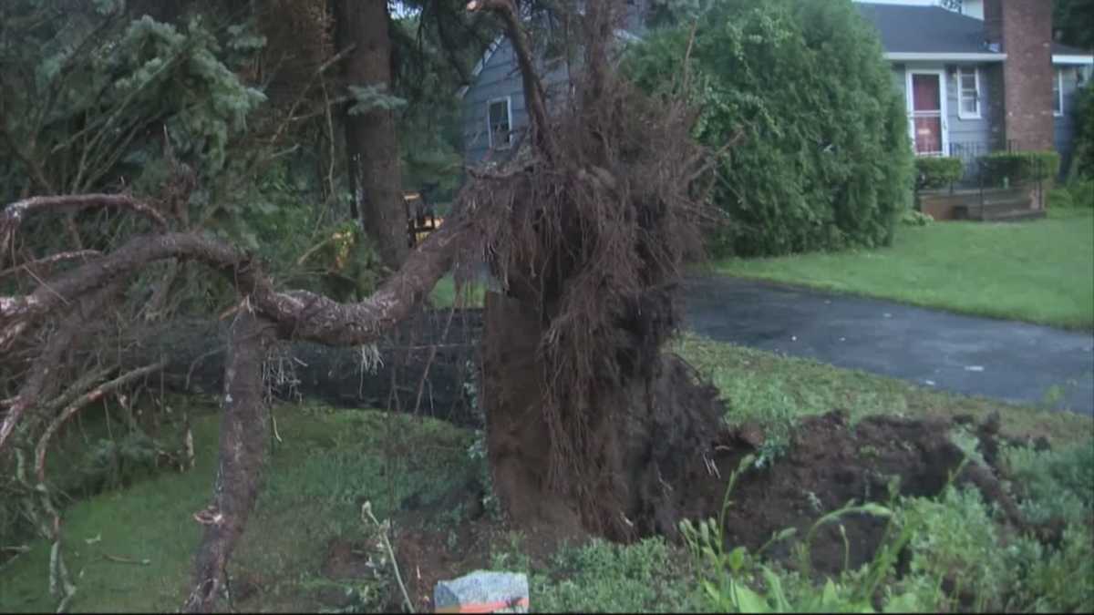 Residents cleaning up after powerful storms tear through
