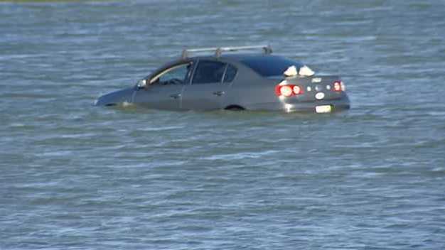 Raw Video: Car crashes into Moss Landing slough