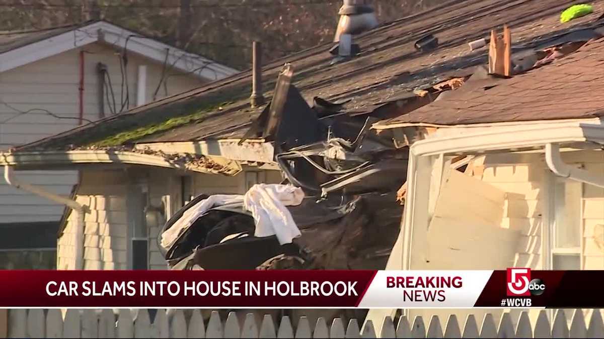 Car lands on house in Holbrook