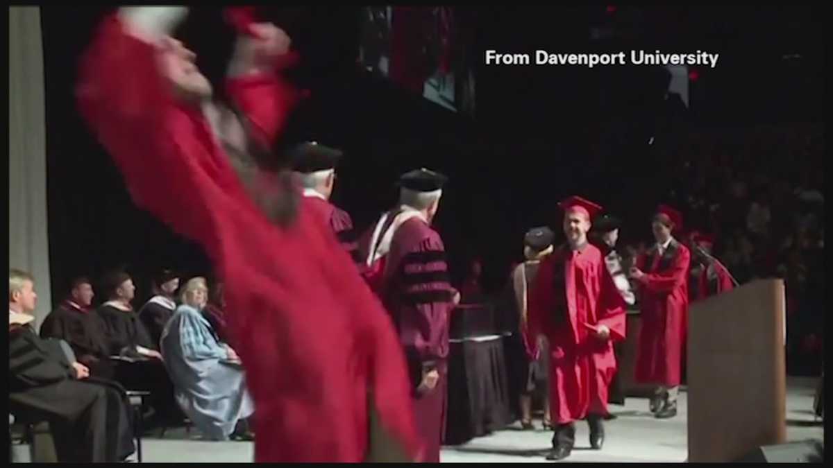 Ouch! Graduate fails at back flip on stage
