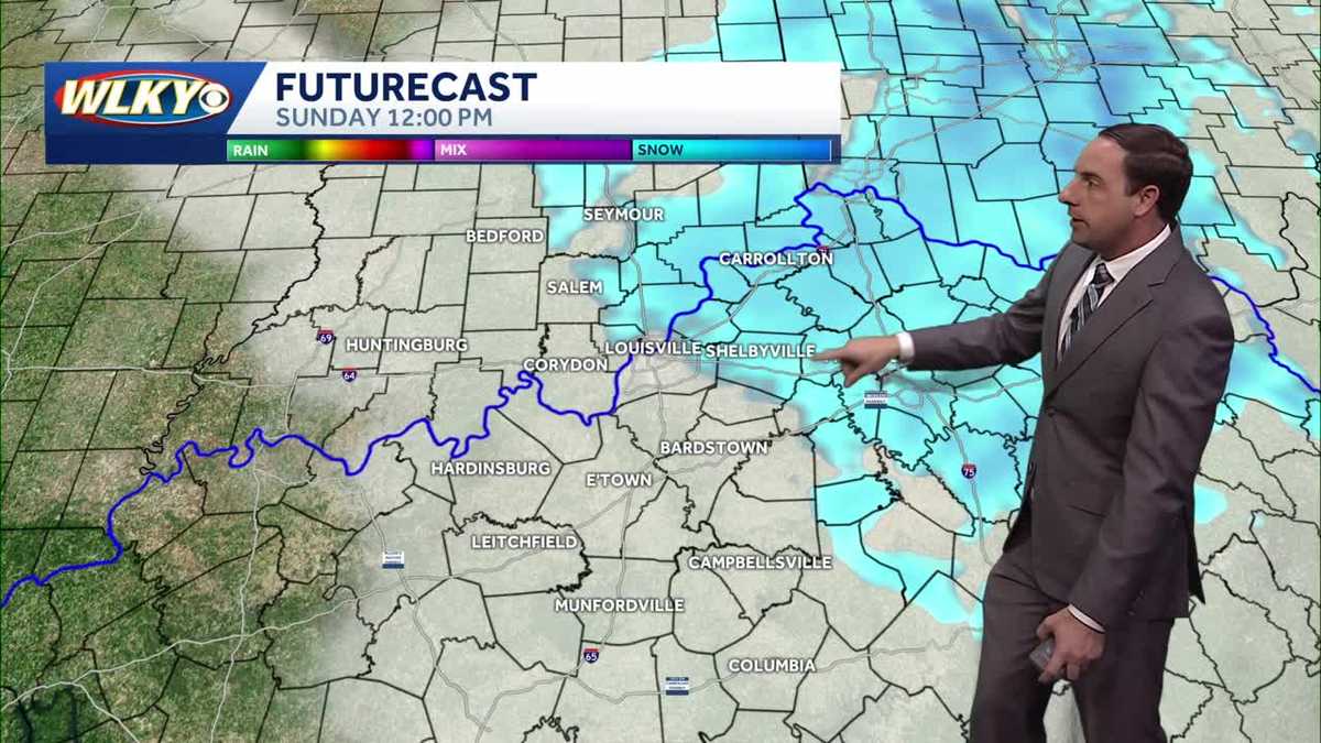 Cold and breezy with a few flurries Sunday