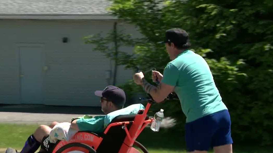 Recycled Percussion's Justin Spencer plans to push friend's wheelchair from Vermont to Maine