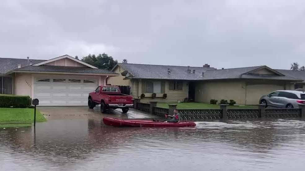 WATCH: Man kayaks in California during flooding