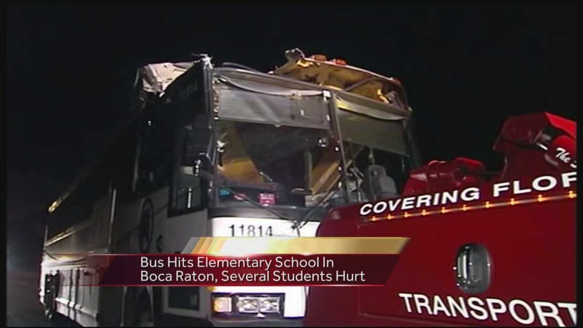 Several students hurt after bus crashes into school