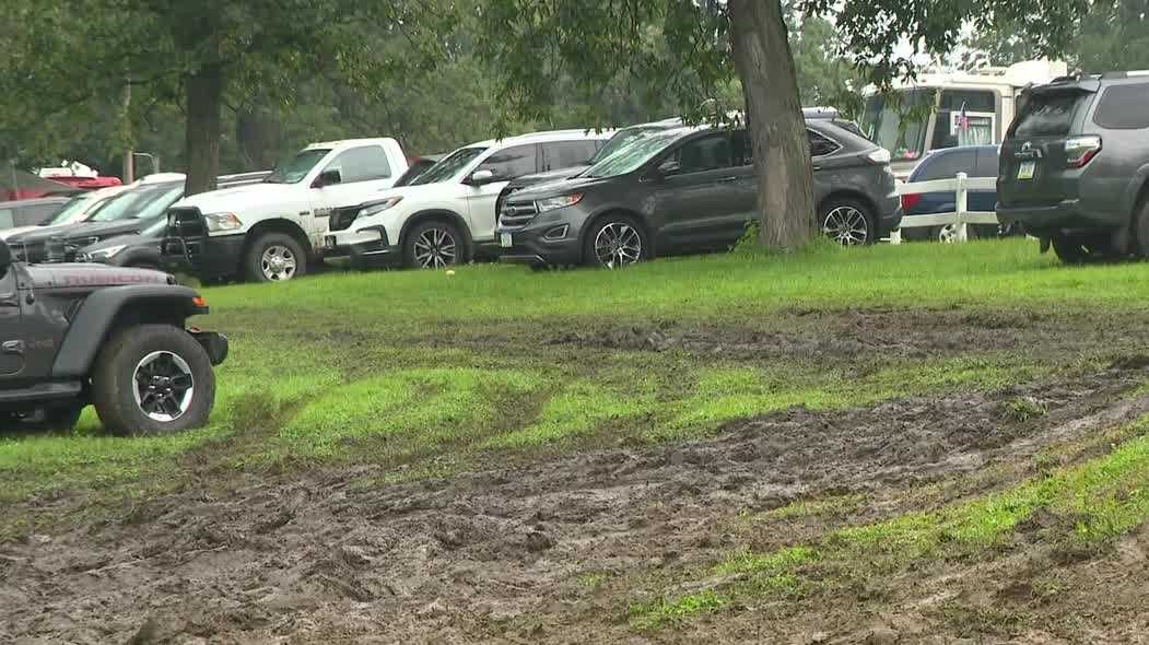 Rain turns Iowa State Fair parking lots into muddy obstacles