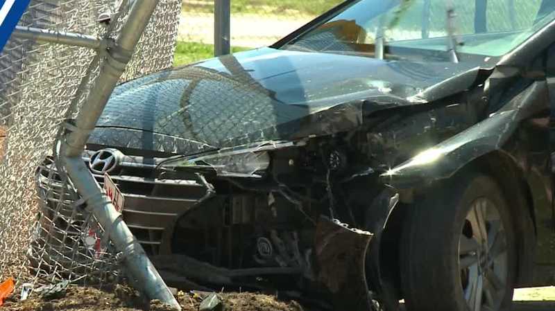 Stolen vehicle driven by juveniles crashes into school baseball field fence