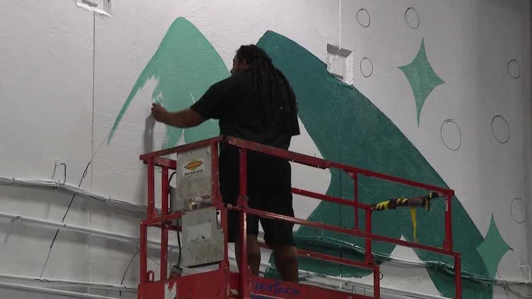 Omaha nonprofit partners with artist to create community-inspired mural