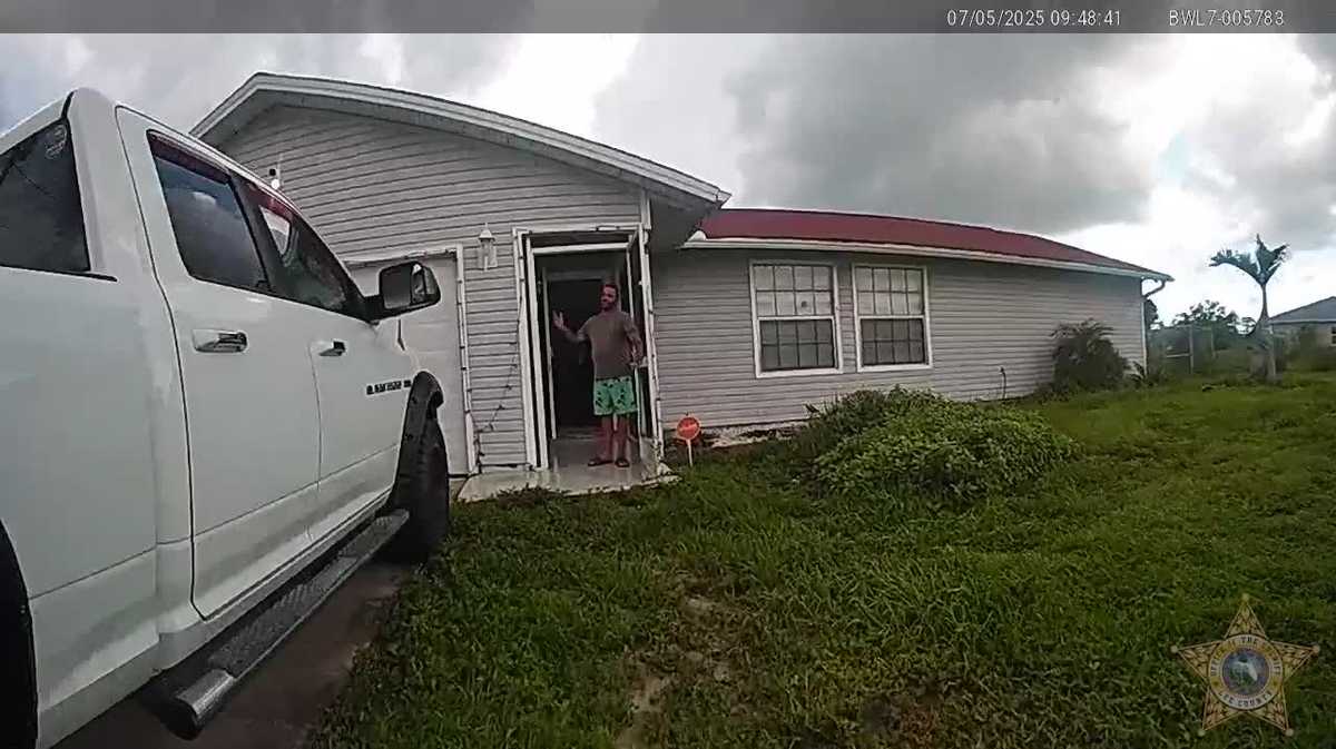 Ball python caught on camera chilling on a pool deck in Lehigh Acres