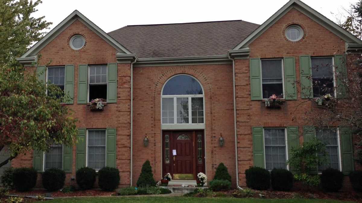Teen accused of trying to kill parents in house fire