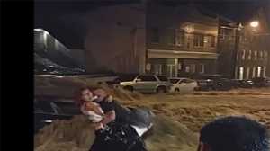 Human chain formed to rescue woman from car