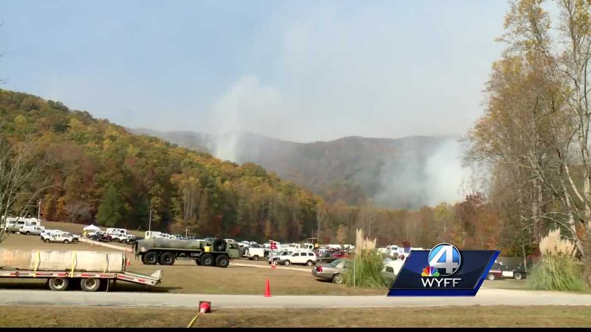 Homeowners in Pickens County who are not evacuating prepare to fight the wildfire