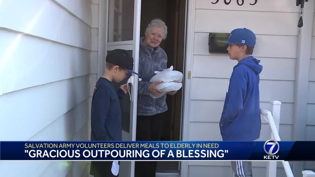 Volunteers Deliver Thanksgiving Meals To The Elderly