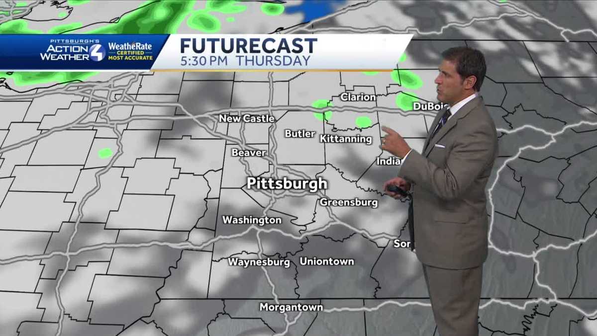 Cool and breezy; isolated showers