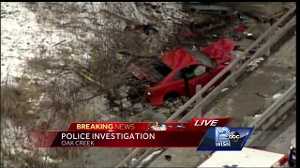 Car crashes over guard rail in Oak Creek