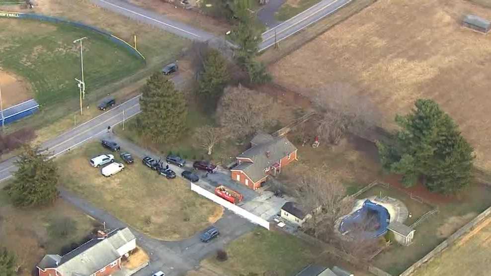 2 found dead from gunshot wounds near school, police say