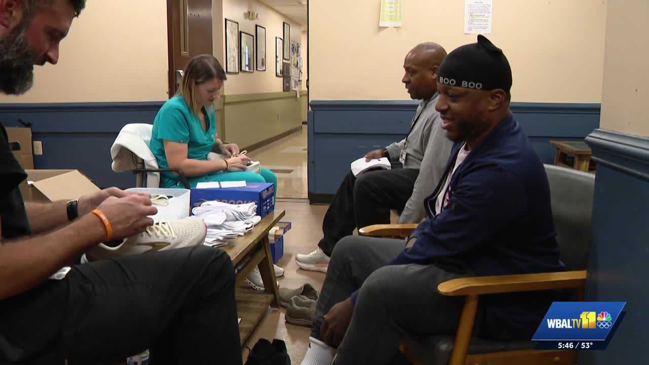 wbaltv.com - Hannah Hoffman - Mercy Medical Center teams give out shoes, socks, exams