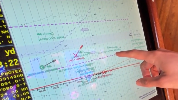 Sagres gunnery officer gives Doug tour of onboard navigation tools