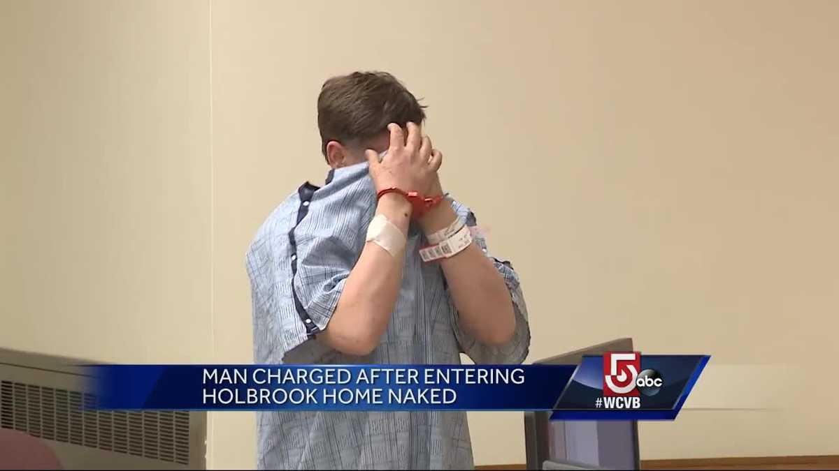 Home invasion suspect hides face in court