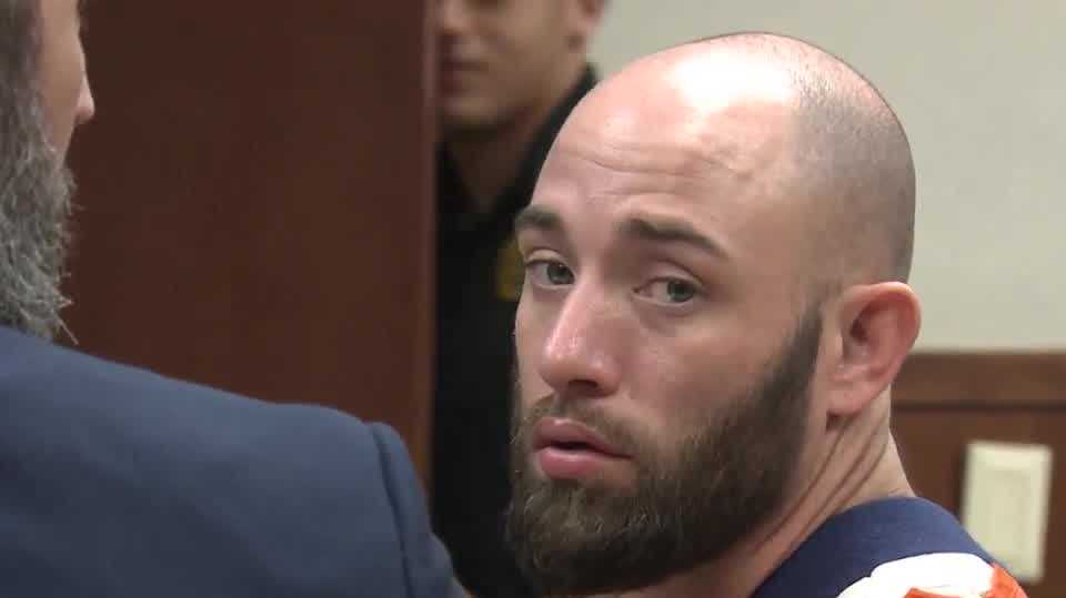 Carjacking suspect shot by LMPD officer pleads not guilty