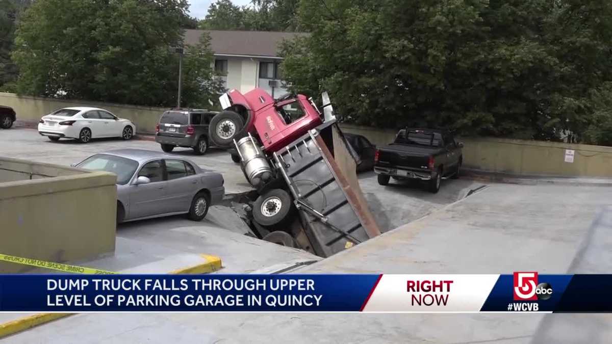 Dump truck falls through upper level of Quincy parking garage