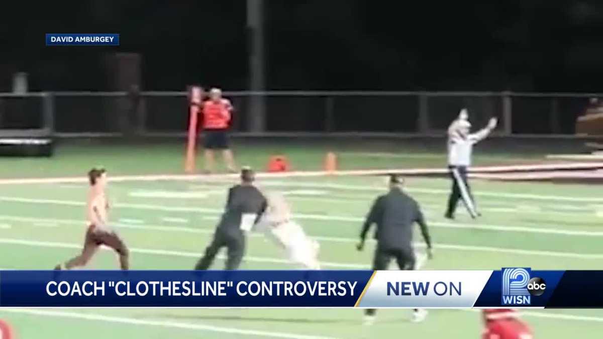On camera Coach clotheslines student who ran on football field