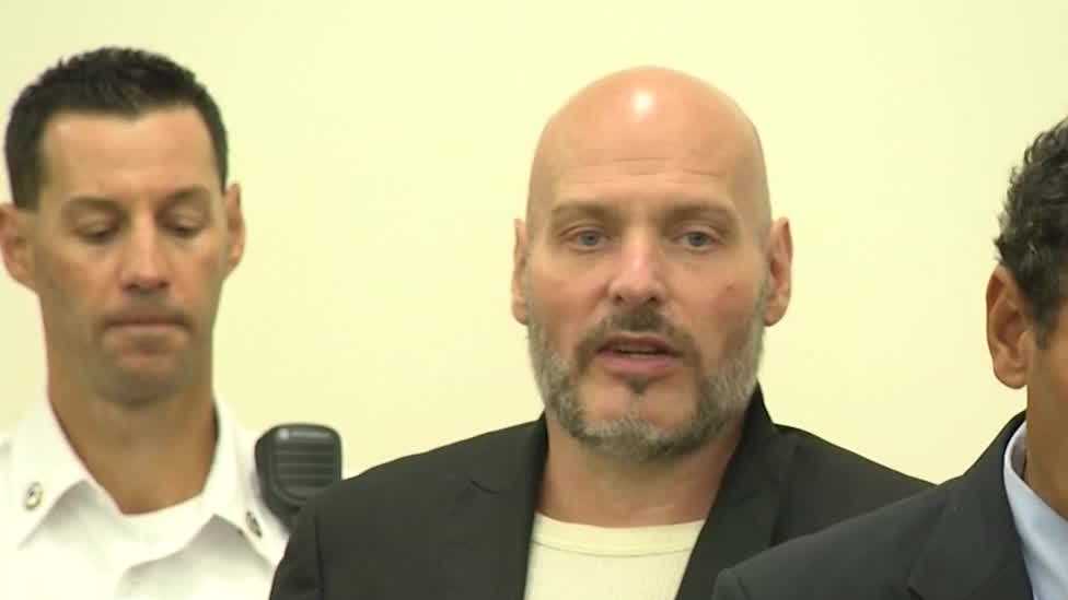 Man charged with murder after body found in shallow basement grave