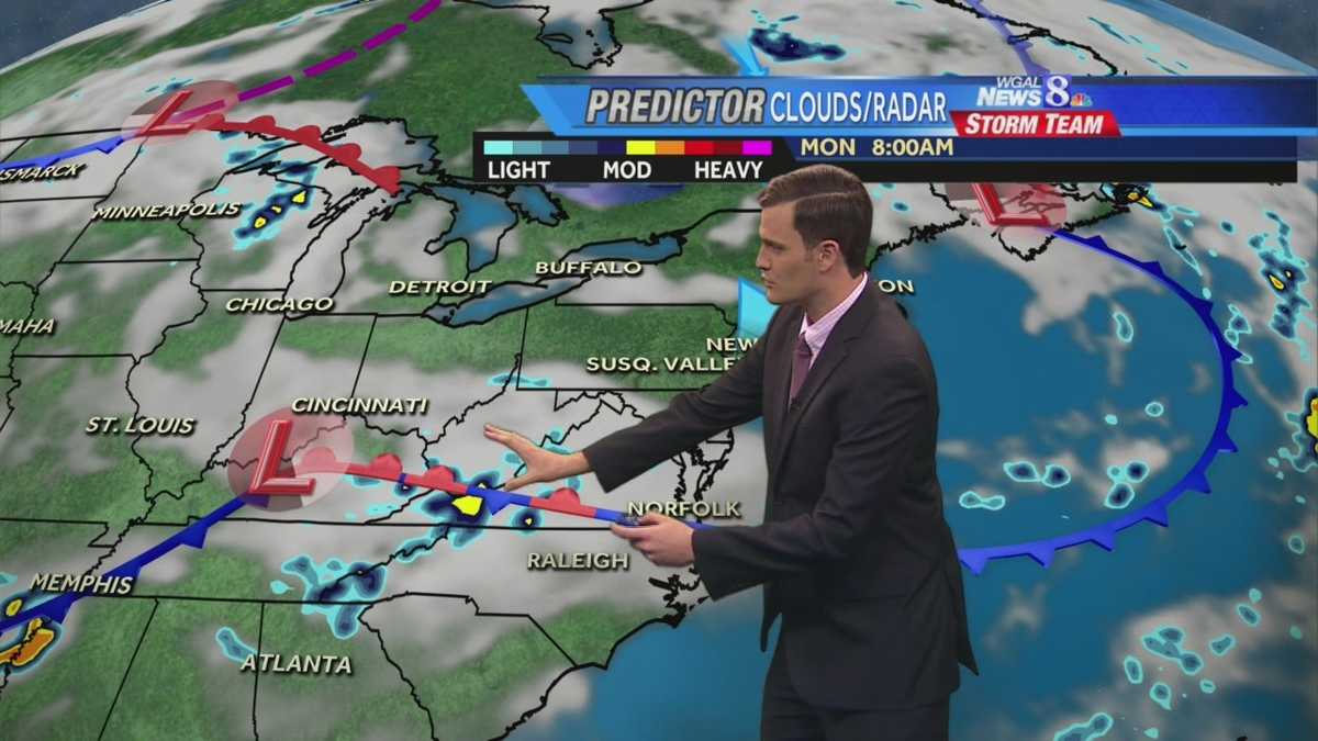 Showers will give way to clearing this afternoon
