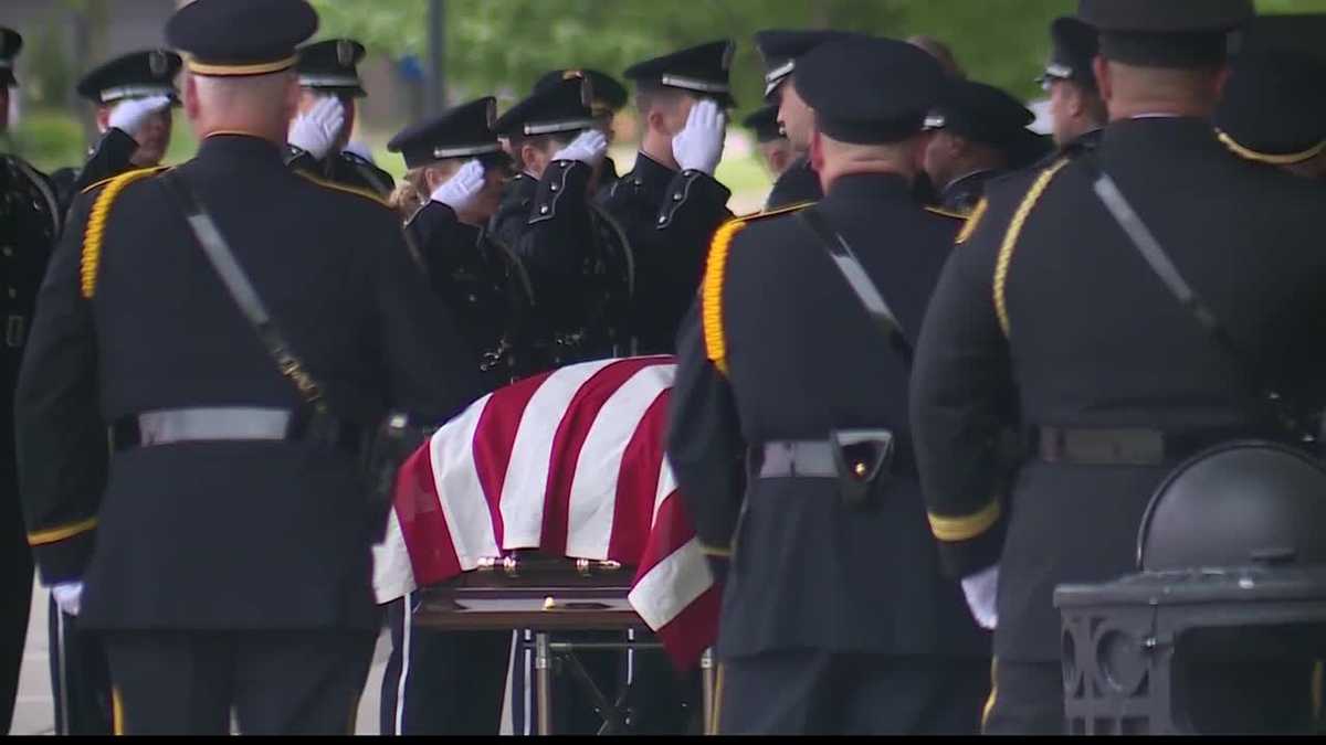 Steady stream of cars pay tribute to fallen Officer Mike Mosher