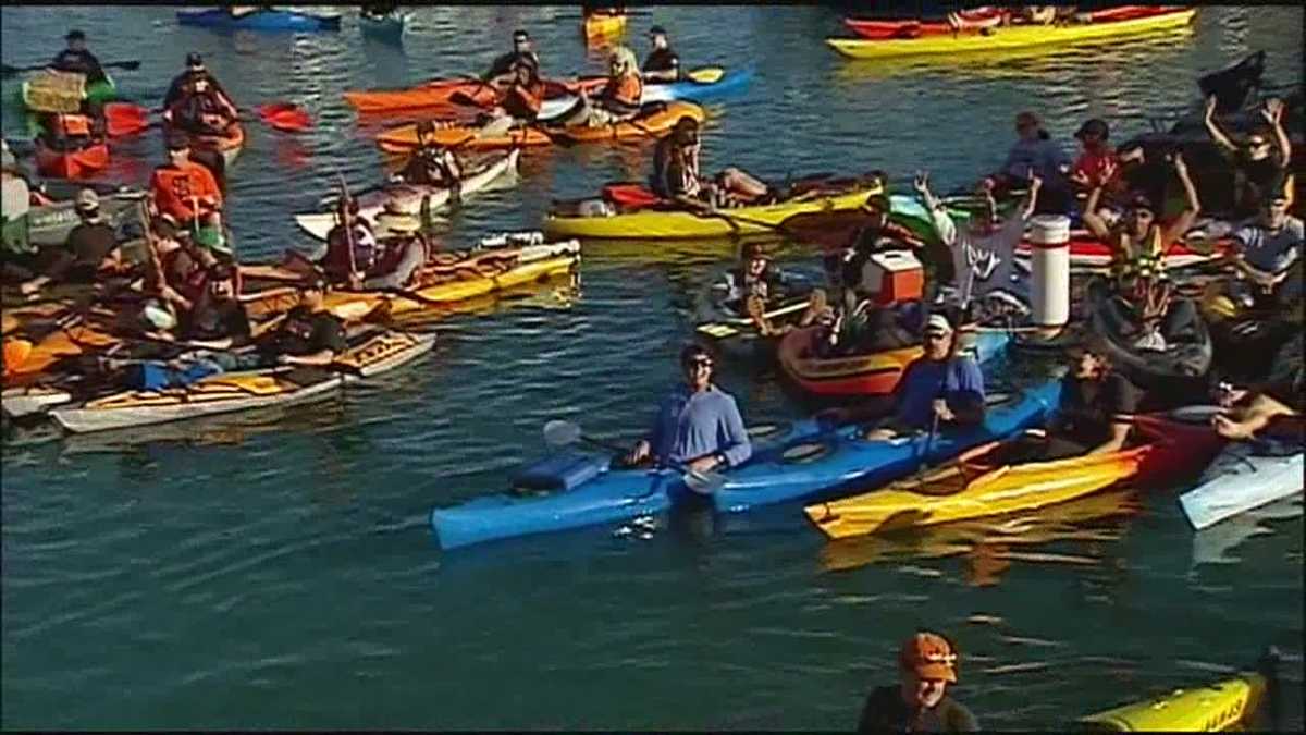 KMBC's Lara Moritz rides a kayak in McCovey Cove