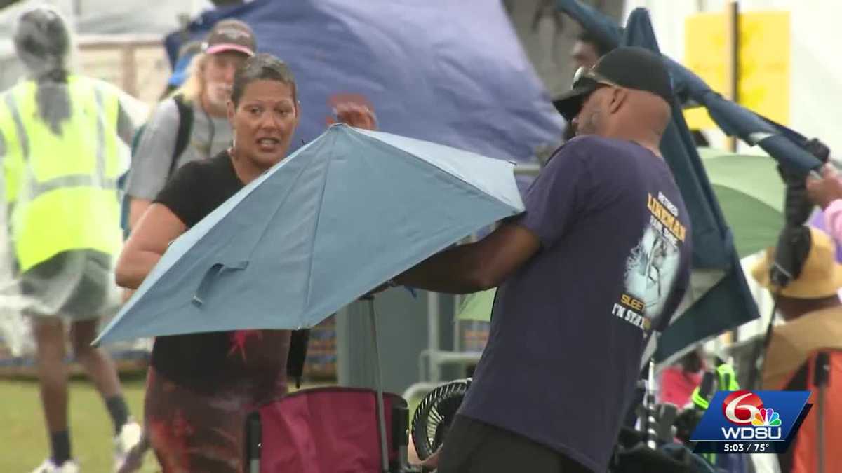 Jazz Fest performances press on in pouring rain Friday