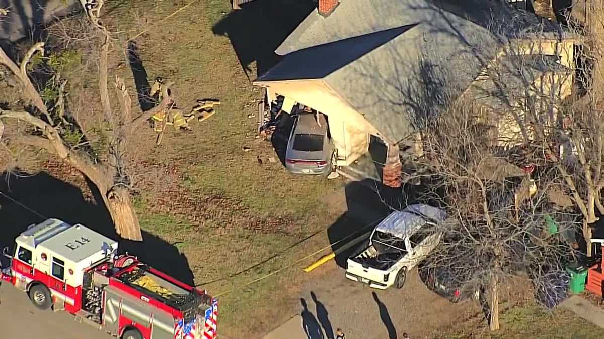 OKC police take 2 into custody after car crashes into home