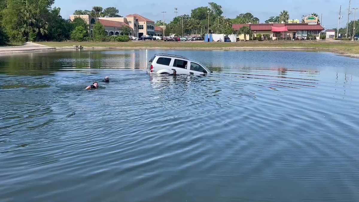 First responders speak after rescuing man from crashed car in pond