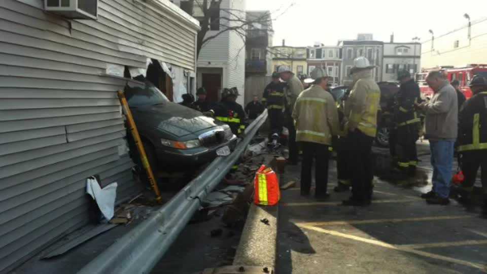 Driver loses control, crashes into building