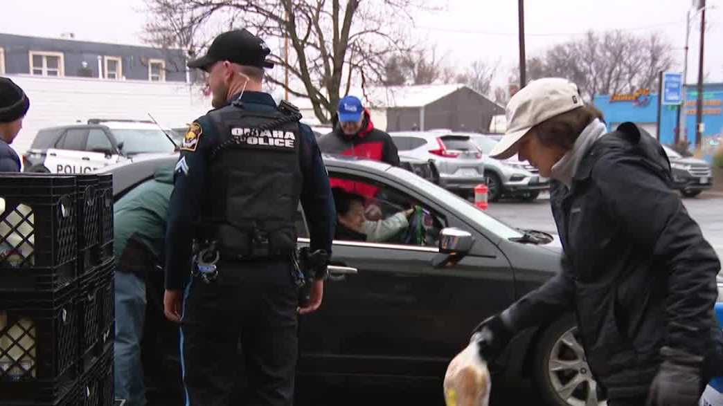 Catholic Charities gives out Thanksgiving meal kits