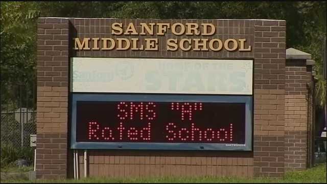 Investigators speak with parents about accused teacher