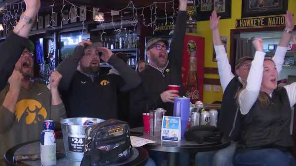 black-and-gold faithful pack clive bar for iowa bowl win
