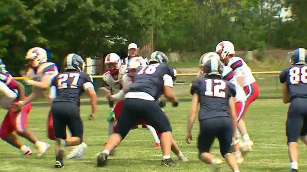 John Stark football upsets Trinity