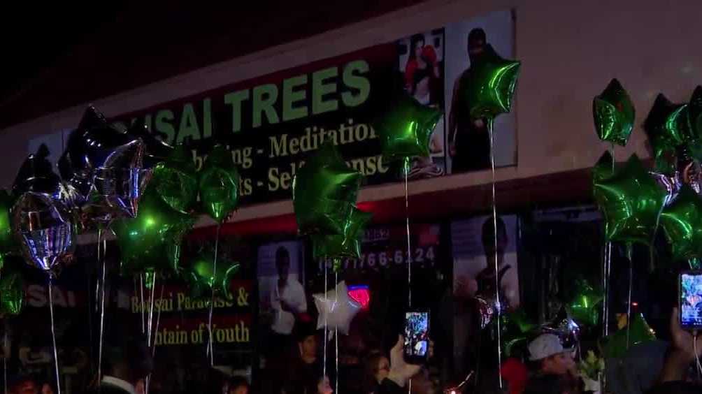 Community holds vigil to remember tattoo artist who died after Orlando police standoff