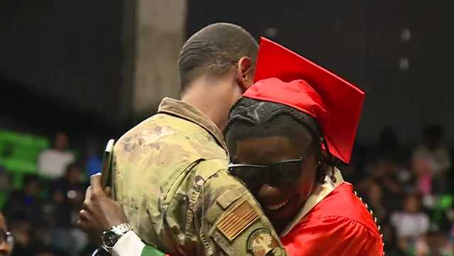 Air Force father surprises Alabama high school graduate after flying home from Japan
