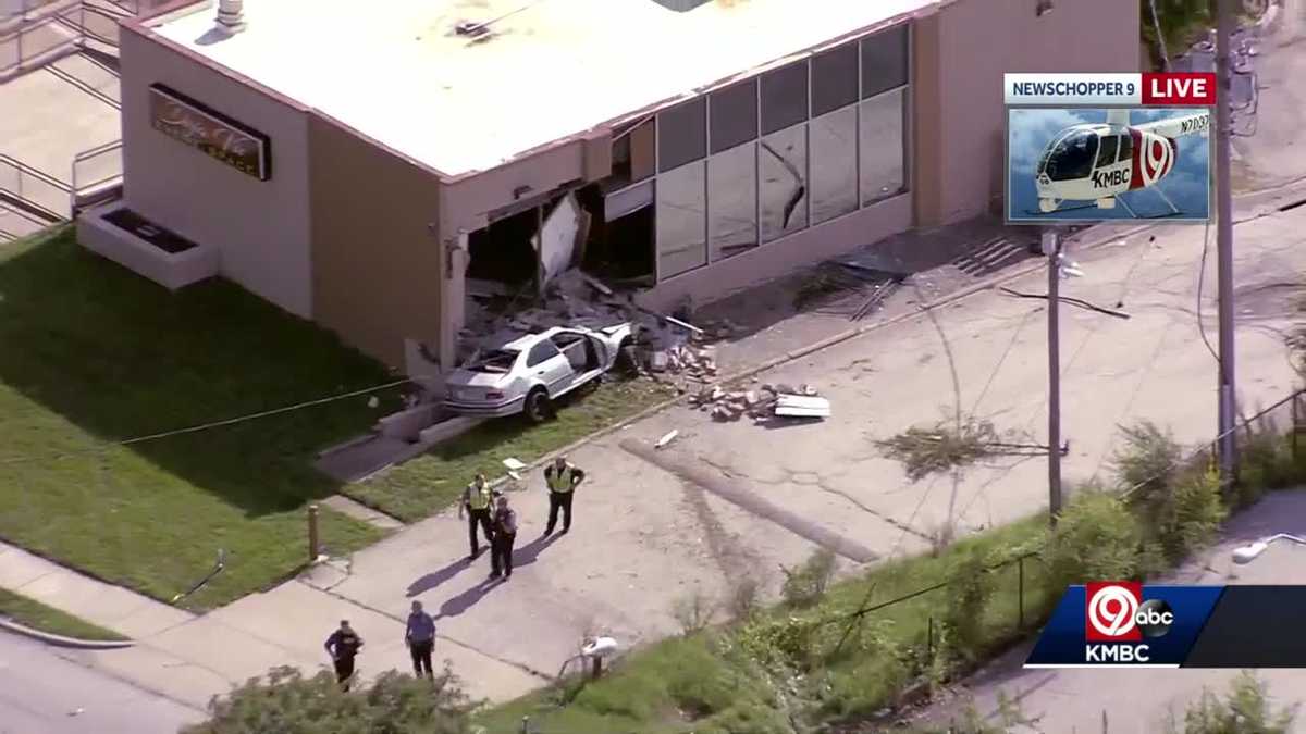 KC police discover man fatally shot after car crashes into building