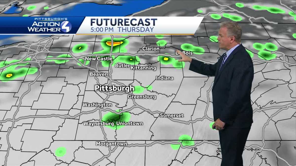 Mostly cloudy with isolated rain showers on Thursday
