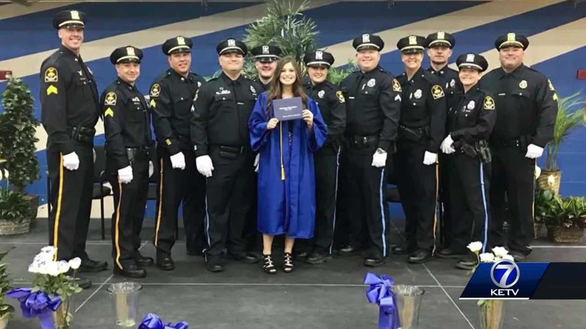 Backed by blue: OPD officers stand in for fallen officer at daughter's ...