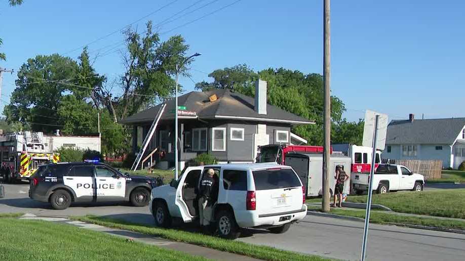 Multiple fire crews battle house fire in north Omaha