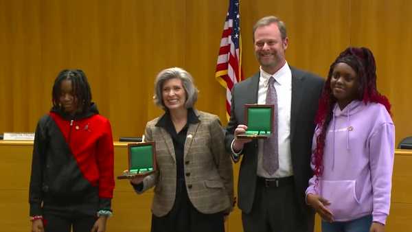 iowa sisters receive carnegie hero medal for icy pond rescue