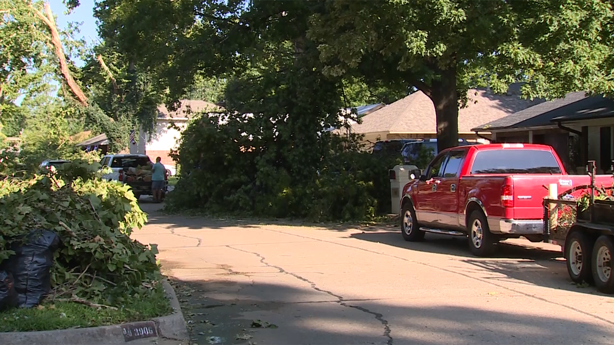 'It was like a maze': Norman neighborhood hit hard by storm works together to clean up
