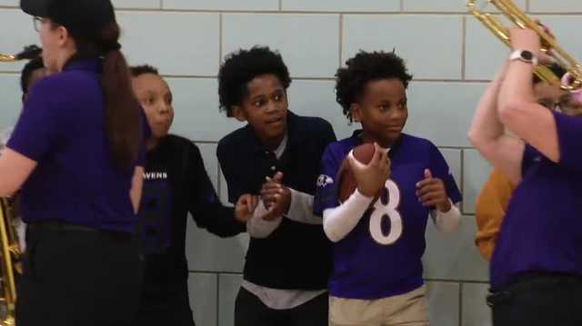 Ravens surprise Baltimore City elementary schools with Purple Friday caravan