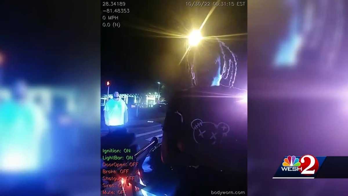 Man unconscious behind wheel of car with kids inside, police say
