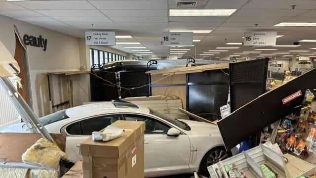 Jaguar crashes into CVS in Acton