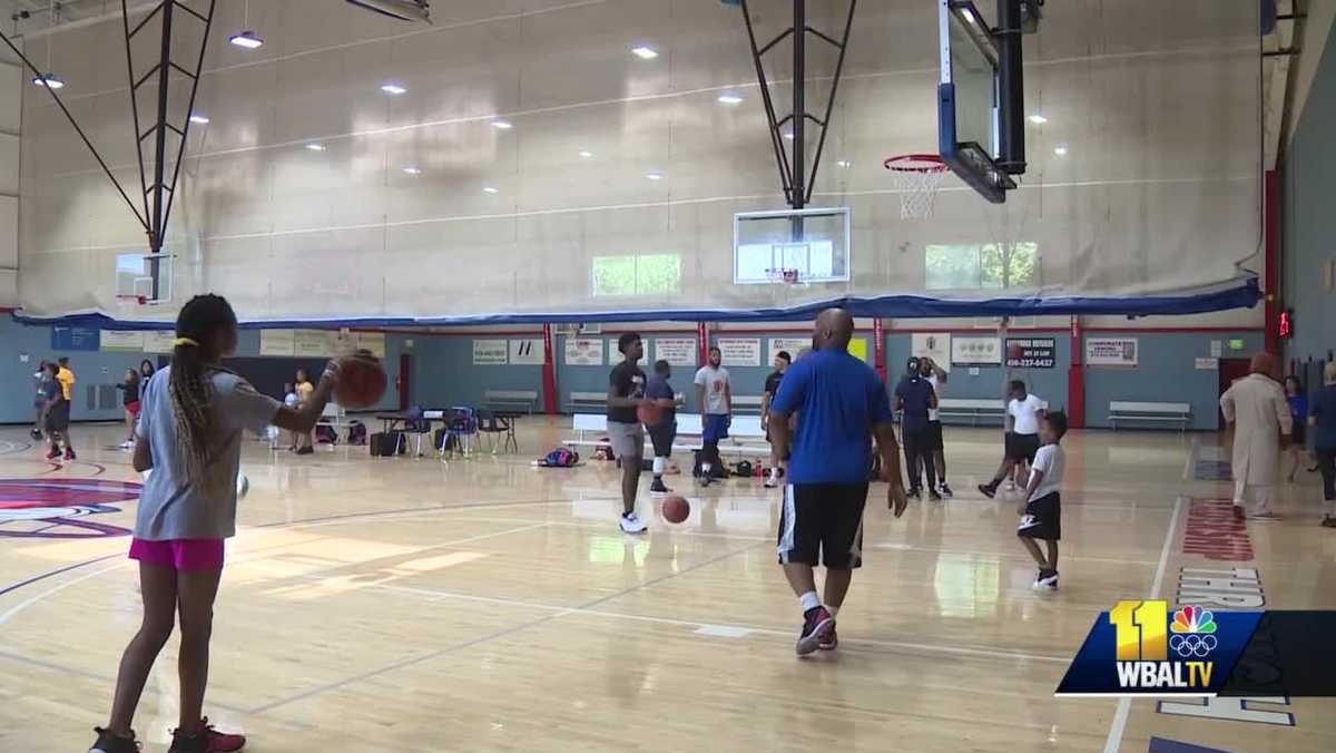 Police are working on community trust through basketball clinics with kids