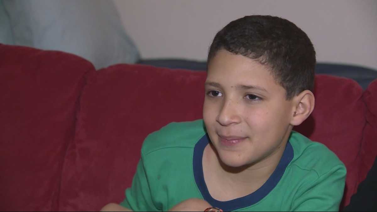 Boy rescued after falling through ice